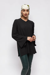 ALBANA New York black textured crepe tunic with wide sleeves and v-neck worn by a model with a floral headscarf.