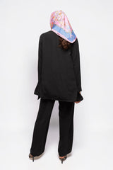 ALBANA New York black textured crepe wide leg pants worn by a model with a pink patterned headscarf, back view