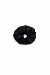 ALBANA New York black ponte fabric scrunchie with a voluminous, sophisticated design for polished hairstyles.