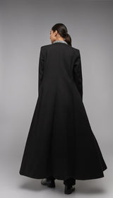 ALBANA New York black tailored maxi coat with a houndstooth collar detail. Water-resistant finish.