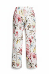 ALBANA New York blush floral print cotton flare pants with a mid-rise tailored silhouette and pleated detail.
