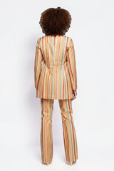 ALBANA New York Carousel Stripe Jacket in a multi-colour vertical stripe pattern worn with matching flare pants.