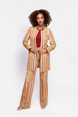 Model wearing ALBANA New York Carousel Stripe Jacket in multi-colour vertical stripes with matching flare pants.