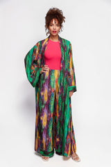 ALBANA New York wide leg pants in a colorful striped silky polyester fabric worn with a matching duster