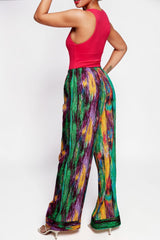 ALBANA New York wide leg pants in a colorful abstract stripe print with an elastic waist, worn by a model.
