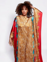 ALBANA New York crimson satin kaftan with gold leopard print and turquoise accents on a model