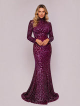 ALBANA New York fuschia ombre sequin mermaid evening gown with long sleeves and mock neck on a blonde model