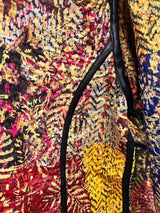ALBANA New York Imperial Mosaic silk long coat featuring vibrant multi-colored patterns and contrast noir trim.