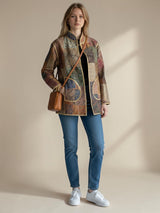 Model wearing ALBANA New York Imperial Mosaic Silk Jacket with noir trim, patch pockets, and open front design.