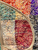 ALBANA New York Imperial Mosaic silk coat featuring vibrant patchwork panels with gold trim and intricate leaf patterns.