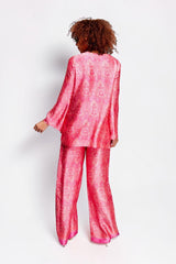 ALBANA New York rose pink silk tunic and matching trousers with vibrant ethnic paisley print on a model