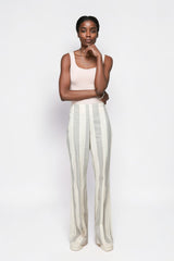 ALBANA New York mid-rise flare pants in cream and grey vertical stripes, featuring double pleats and cotton fabric.
