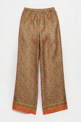 ALBANA New York apricot silk wide leg pants with an intricate paisley print and an elastic waistband.