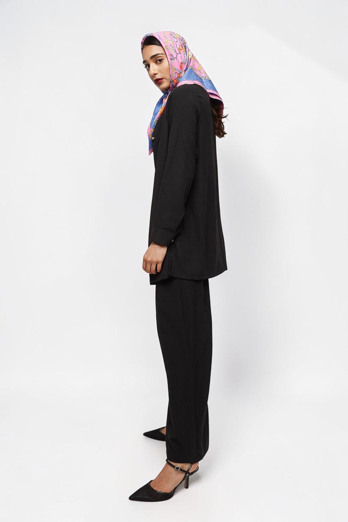 ALBANA New York black textured crepe wide leg pants worn by a model with a pink patterned headscarf and heels