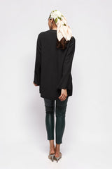 ALBANA New York black textured crepe tunic with wide sleeves worn by a model with a floral headscarf, back view