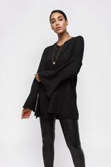 ALBANA New York black textured crepe tunic with wide sleeves and high neckline worn by a model