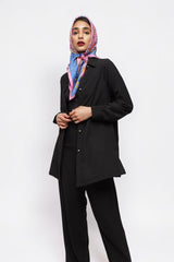 ALBANA New York black textured crepe wide leg pants worn by a model with a colorful patterned headscarf