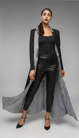 ALBANA New York black tailored maxi coat with houndstooth lining and water-resistant finish.