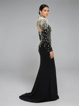 ALBANA New York black mermaid evening gown with pearl and crystal beaded capelet, mock neck, and open back detail.