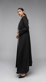 ALBANA New York black tailored maxi coat with a houndstooth collar detail and water-resistant finish.