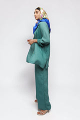 ALBANA New York blue textured linen button-down shirt and matching pants worn by a model with a silk headscarf