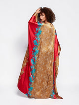 ALBANA New York crimson satin kaftan with gold leopard print and turquoise floral panels on a model