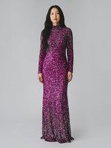 ALBANA New York fuschia ombre sequin mermaid evening gown with long sleeves and mock neck on a model