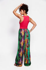 ALBANA New York wide leg pants in a vibrant multicolored abstract print with an elastic waist on a model