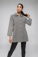ALBANA New York Nadia oversized unlined jacquard jacket with a geometric pattern in black and white, and gold buttons.