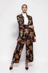 ALBANA New York printed foliage crepe shirt and matching wide leg pants in black with orange and cream leaf patterns.