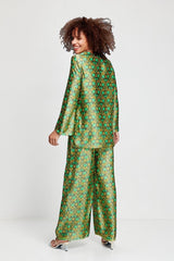 ALBANA New York Sage Scrolls Silk Tunic in green with a vibrant floral pattern. Relaxed fit, 100% silk.