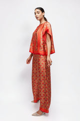 ALBANA New York silk wide leg pants and matching top in vibrant red and orange floral Mandarin Scrolls print