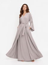ALBANA New York Stone Veil maxi kaftan in soft stone grey with long sleeves, waist tie, and elegant draped silhouette.