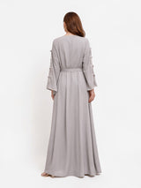 Back view of ALBANA New York Stone Veil maxi kaftan in stone grey with long sleeves and adjustable waist tie.